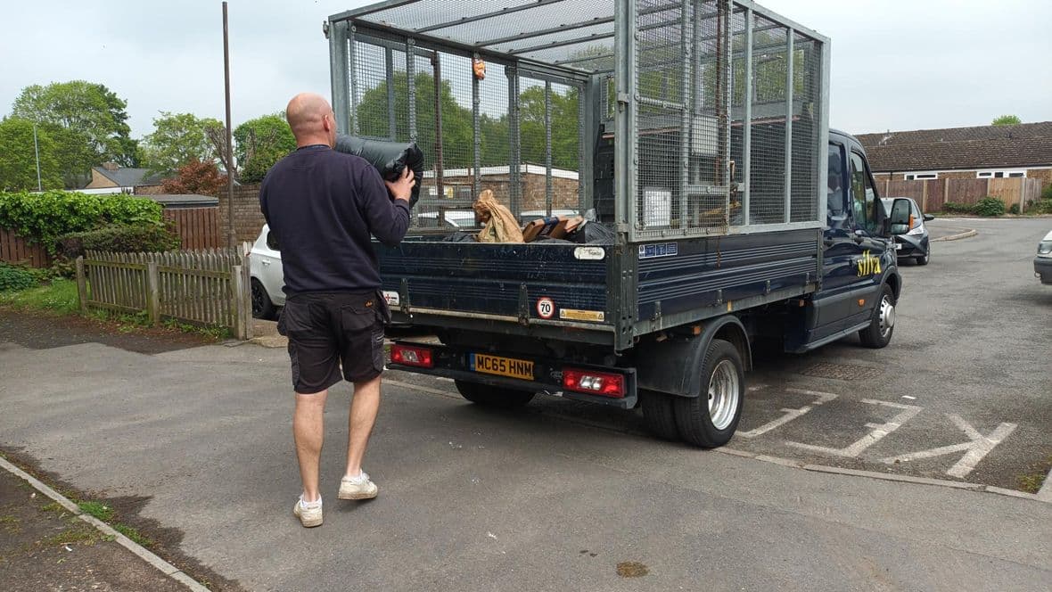 Craig rubbish bag in van