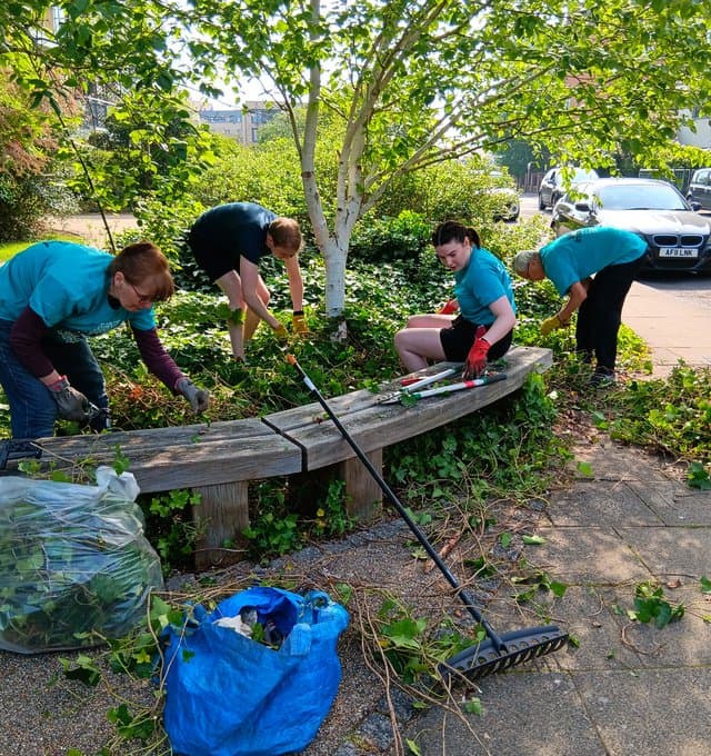 Team working on Saints in the City Day start May 24