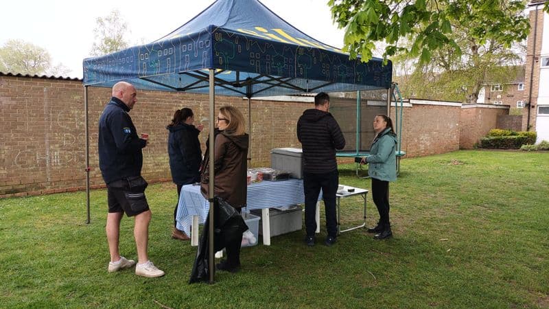 chatting with colleagues and customer